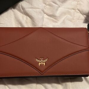 MCM Diamond leather Wallet on Chain (WOC) in the color Coconut Shell.